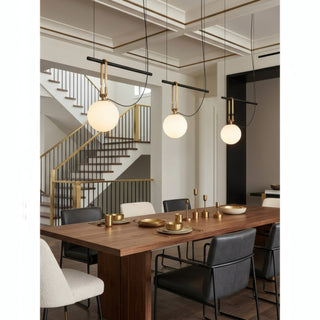 Axiom Tethered Globe Pendant Light