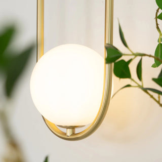 Lyrice Capsule Orb Sconce